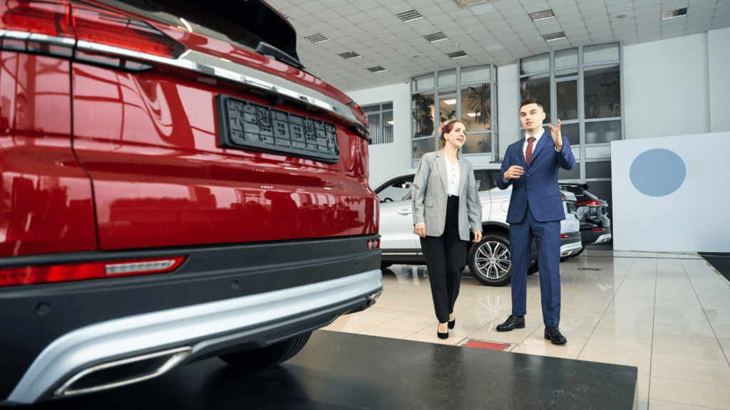 Car dealer explained to a woman about insurance policy